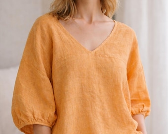 Camicetta da donna ampia in lino, top estivo con scollo a V e maniche a sbuffo, abbigliamento minimalista fatto a mano.