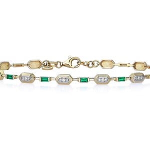 May include: A gold bracelet with alternating geometric shapes, set with white diamonds and emeralds. The bracelet has a clasp closure and is shown against a white backdrop. This delicate piece of jewellery.