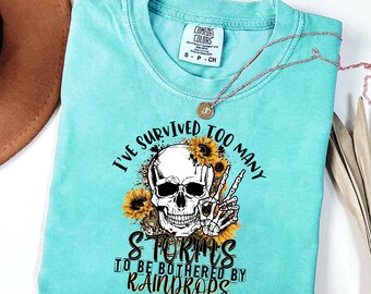 I’ve Survived Too Many Storms Shirt - Skeleton Rain Humor Tee, Strong Mindset Gothic Graphic Shirt