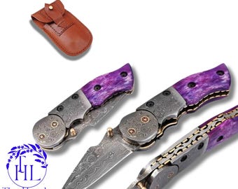 Cuchillo plegable de acero de Damasco hecho a mano: mango de hueso y funda de cuero.