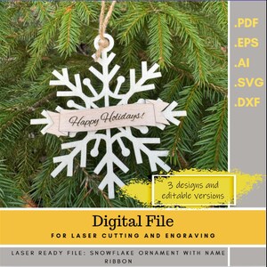 May include: A white wooden snowflake ornament with a banner that reads "Happy Holidays!" is suspended from a natural twine string. The ornament is displayed against a backdrop of green pine needles. The image also includes text that says "Digital File".