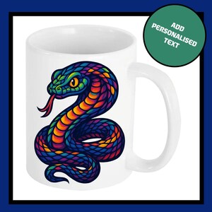May include: White ceramic mug with a colourful snake illustration. The snake is depicted with vibrant hues of blue, green, orange, and purple. The mug has a white handle and the text "ADD PERSONALIZED TEXT" on a green circle.