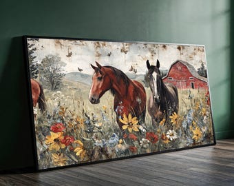 May include: Framed art print featuring a pastoral scene with three horses in a field of wildflowers. A red barn is visible in the background. The artwork has a vintage, distressed look with a black frame.