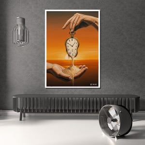 May include: A framed art print showing a surrealist image. A pocket watch is held by a hand, with the watch face melting into sand held in another hand. The background features a sunset with orange and yellow colours.