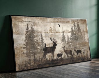 May include: A framed art print featuring a forest scene with deer silhouettes. The artwork has a rustic, weathered appearance with a neutral color palette of browns and grays. The image includes trees, deer, and a bird in flight.