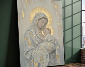 May include: A framed wall art print featuring a painting of a figure holding a child, both adorned with gold leaf halos and geometric gold accents on their light-colored robes. The artwork is set against a soft, neutral background with gold details.