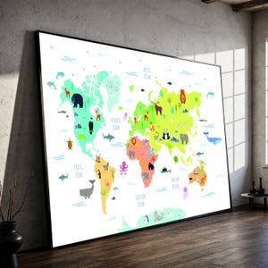 May include: A large framed wall map featuring a colorful world map with various animal illustrations placed across the continents. The map includes labels for the Arctic, Atlantic, Pacific, Indian, and Southern Oceans, with a white background.