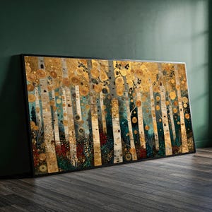 May include: Abstract art print depicting a forest of birch trees with gold and teal details. The artwork has a mosaic-like appearance with circular and vertical patterns. The framed canvas leans against a dark green wall.