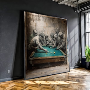 May include: Large framed artwork showing a group of men playing billiards. The painting features a teal pool table, brown wood trim, and several white and yellow billiard balls. The men are dressed in neutral tones, and the background is a textured, aged wall.