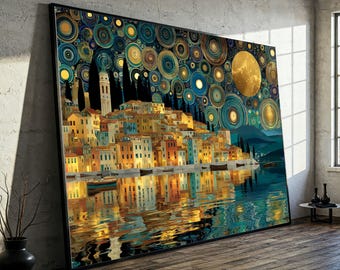 May include: Large framed art print of a coastal town at night. The artwork uses blues, yellows, and oranges. Buildings are reflected in the water, and the sky is filled with circular patterns and a large moon. The print is displayed on a wooden floor.