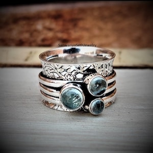 Aquamarijn sterlingzilveren spinnerring: handgemaakte meditatie fidget-sieraden