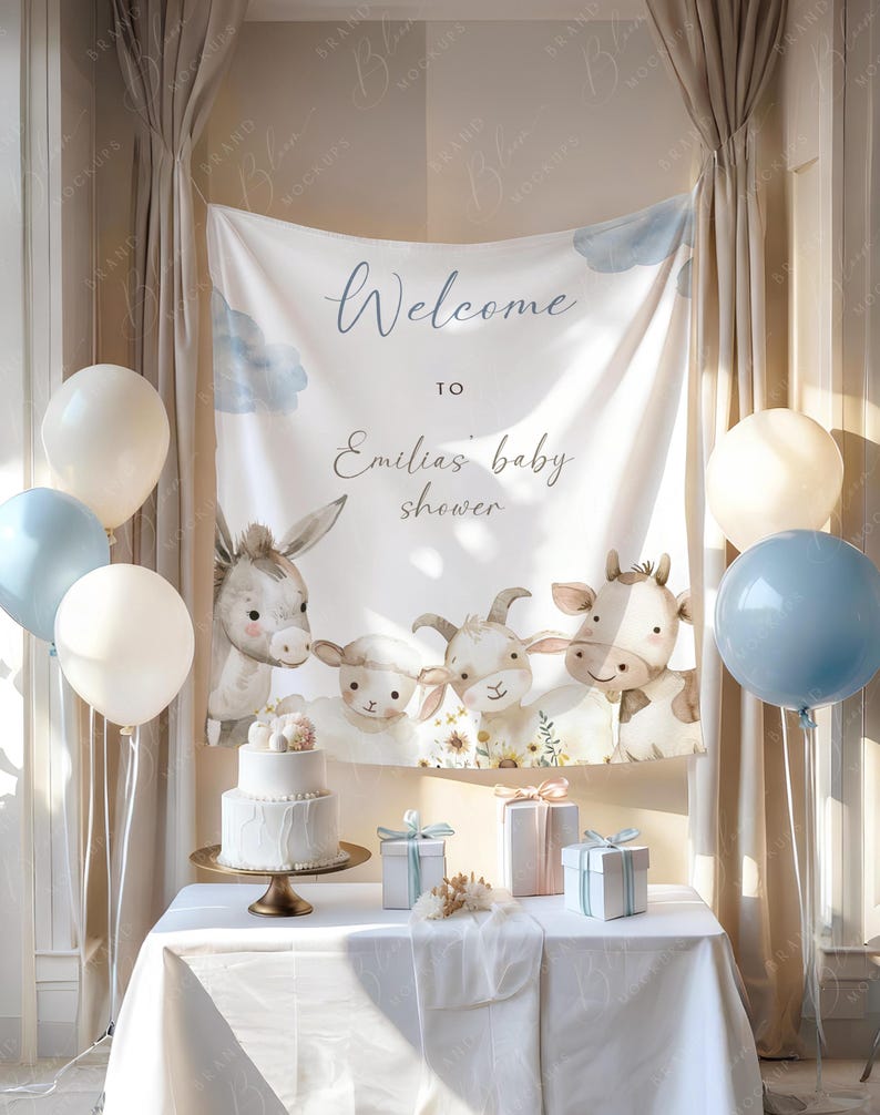 May include: A baby shower setup featuring a white cake, gifts, and balloons. A banner displays "Welcome to Emilias baby shower" with farm animal illustrations. The colour scheme is soft, with white, blue, and beige tones.