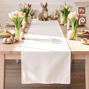 May include: A wooden dining table set for Easter, featuring a white table runner, fresh tulips in vases, lit candles, and a decorative bunny figurine. Plates of food and eggs complete the festive scene, creating a bright and inviting atmosphere.