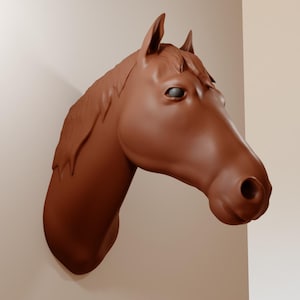 May include: A brown horse head sculpture fixed to a white wall. The sculpture is a detailed representation of a horse's head, with visible eyes, nostrils, and mane. The sculpture is a decorative item.