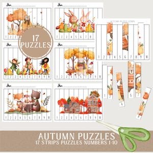 May include: Watercolor autumn-themed puzzles with illustrations of animals, children, and houses. The set includes 17 puzzles with strips numbered 1-10. A pair of green scissors is in the foreground.