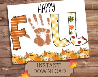 May include: A white print with the words "HAPPY FALL" in black and orange. The letter "F" is orange with brown stripes, the "A" is a handprint, and the "L"s are yellow plaid and autumn leaves. A banner at the bottom says "INSTANT DOWNLOAD".