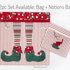 May include: A set of two red and white striped zippered bags with elf legs and a red hat design. The larger bag has a red, white, and green polka dot fabric lining. The smaller bag has a plain white lining. The bags are labeled "Sweet".
