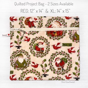 May include: A quilted project bag with a Christmas theme featuring Santa Claus, holly wreaths, and red birds. The bag has a zipper closure and is available in two sizes: 12 inches by 14 inches and 14 inches by 15 inches.