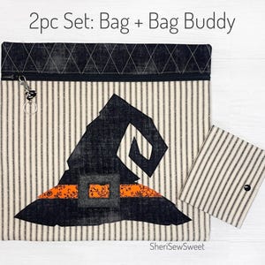 May include: A 2pc set of witch hat-themed zippered bags. The larger bag has a black witch hat with an orange and black patterned band on a white and black striped fabric. The smaller bag is a matching white and black striped fabric. The text "2pc Set: Bag + Bag Buddy" is at the top of the image. The text "SheriSewSweet" is at the bottom of the image.