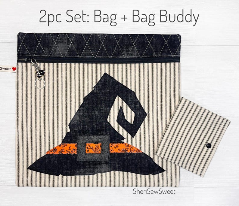 May include: A 2pc set of witch hat-themed zippered bags. The larger bag has a black witch hat with an orange and black patterned band on a white and black striped fabric. The smaller bag is a matching white and black striped fabric. The text "2pc Set: Bag + Bag Buddy" is at the top of the image. The text "SheriSewSweet" is at the bottom of the image.