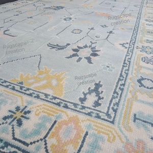 Hand Knotted Wool Oushak Rug: Light Blue & Pink Modern Design