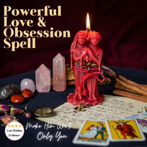 May include: A red candle in the shape of two figures, with a burning wick. The candle is tied with red string and decorated with dried flowers. Crystals, tarot cards, and text reading "Powerful Love & Obsession Spell" and "Make Him Want Only You" are also visible.