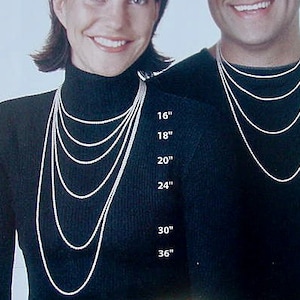 May include: A side-by-side comparison of necklace lengths, showing a woman wearing a variety of chain lengths from 16 to 36 inches and a man wearing chain lengths from 18 to 30 inches.