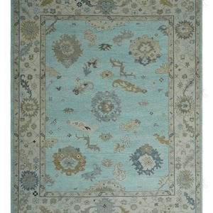 Hand-Knotted Oushak Wool Rug: Sky Blue & Beige Floral Area Rug