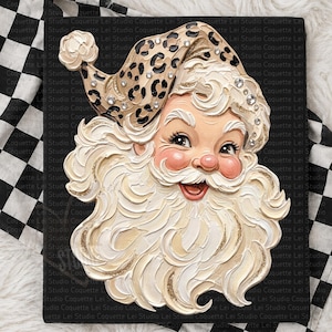 May include: A textured wall art piece featuring a Santa Claus face with a thick, cream-colored impasto beard and mustache, wearing a tan hat with a black leopard print pattern and clear rhinestone accents, set against a solid black background.
