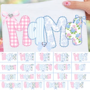 May include: A white t-shirt featuring the word "MAMA" in large, decorative letters. The letters are in pink gingham, blue stripes, and floral patterns, with bows and jewel accents. Below are smaller text options.