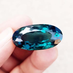 Dark Green Hydro Topaz Gemstone: 42 Carat Long Oval Pendant (33x15x13 mm