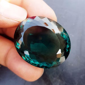 Hydro Green Topaz Gemstone: 86 Carat Oval, 32x27x13mm, Lab Grown