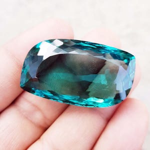 Dark Green Hydro Topaz Gemstone: 75 Carat Fancy Shield Cut, Lab Grown