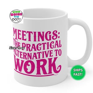 White ceramic mug with the phrase “Meetings: The Practical Alternative To Work” in bold pink text, styled on a black marble countertop in a luxury condo. Perfect gift for co-worker, colleague, boss - friend mum dad girlfriend boyfriend husband wife partner or special person in your life.
