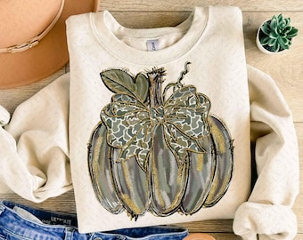 Paquete PNG de calabaza con camuflaje estilo occidental, lazo coquette desgastado con aires otoñales de camuflaje retro, diseño de calabaza con camuflaje PNG, temporada acogedora de camuflaje