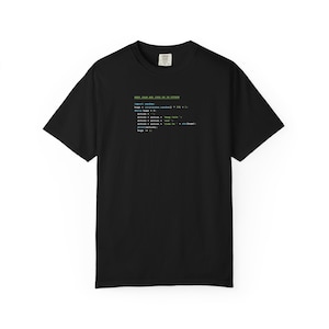 May include: Black t-shirt with the text "KEEP CALM AND CODE IN PYTHON" and Python code printed in green, blue, and yellow. The shirt is a crew neck and has short sleeves.