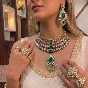 Moissanite polki grand ruby emerald bridal necklace set with earrings and tikka/red polki necklace