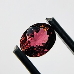 Pink Tourmaline Gemstone: 1.74 Ct Oval Faceted Crystal for Jewelry