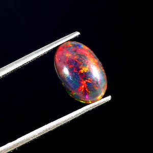 11x9mm Oval Black Opal Cabochon: Multi-Fire Gemstone