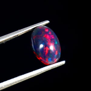Ethiopian Black Opal Cabochon: Oval Rainbow Fire Gemstone (16x12mm