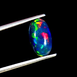 Ethiopian Black Opal Cabochon: Oval Rainbow Fire Gemstone (12x10mm