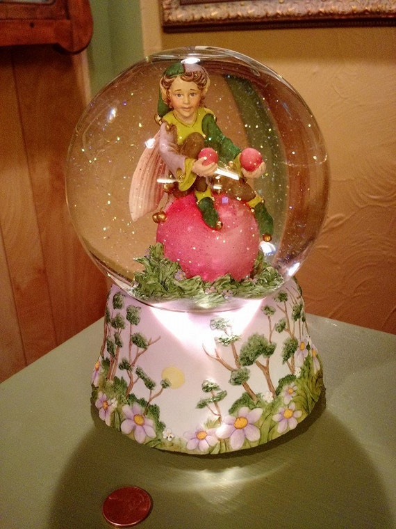 small snow globe figurines