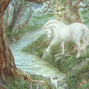 May include: A watercolour painting depicting a white unicorn in a forest setting. The unicorn is positioned near a stream, its front hoof resting on a rock. The scene is framed by trees and greenery, creating a tranquil and magical atmosphere.