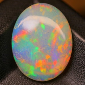 10,90 Ct äthiopischer Opal | 21x17x5mm Großes Oval Cabochon | Blitzfeuer | Regenbogen-Farbspiel | Welo Kristallopal | Sammlerstück