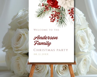 May include: A white sign on a wooden easel with the text "Welcome to the Anderson Family Christmas Party". The sign is decorated with watercolor illustrations of red roses, white flowers, green pine needles, and red berries. The background features white roses.