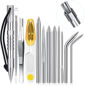 May include: A set of silver metal tools, including a pointed awl, tweezers, and various needle-like instruments. A small, yellow and white plastic tool is also included. The tools are arranged against a white background.