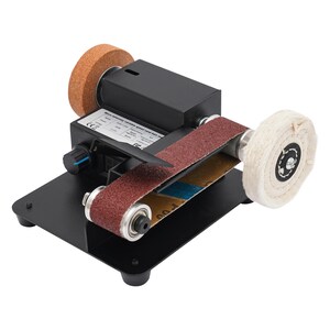 a sanding machine with a sanding wheel and a sanding belt. The sanding machine has a black base and a red sanding belt.