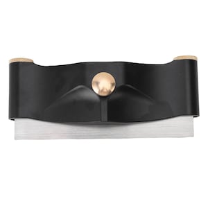 May include: A black hand plane with a silver blade. The plane has brass accents on the ends and a brass knob in the center. The tool is designed for woodworking and shaping materials.