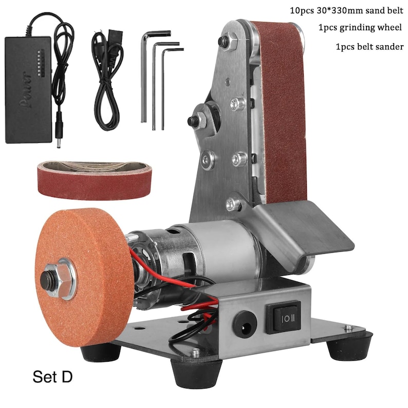a sanding machine with various components, including a sanding wheel, belt sand, and other tools. The machine appears to be a DIY project, as indicated by the text "10pieces 30oz. 330mm sand belt" and "1piece grinding wheel".