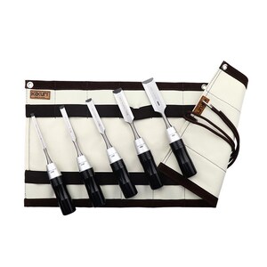 May include: A set of five wood chisels with black handles and silver blades, displayed in a cream-colored canvas tool roll. The tool roll has brown trim and the brand name "kakuri" is visible.